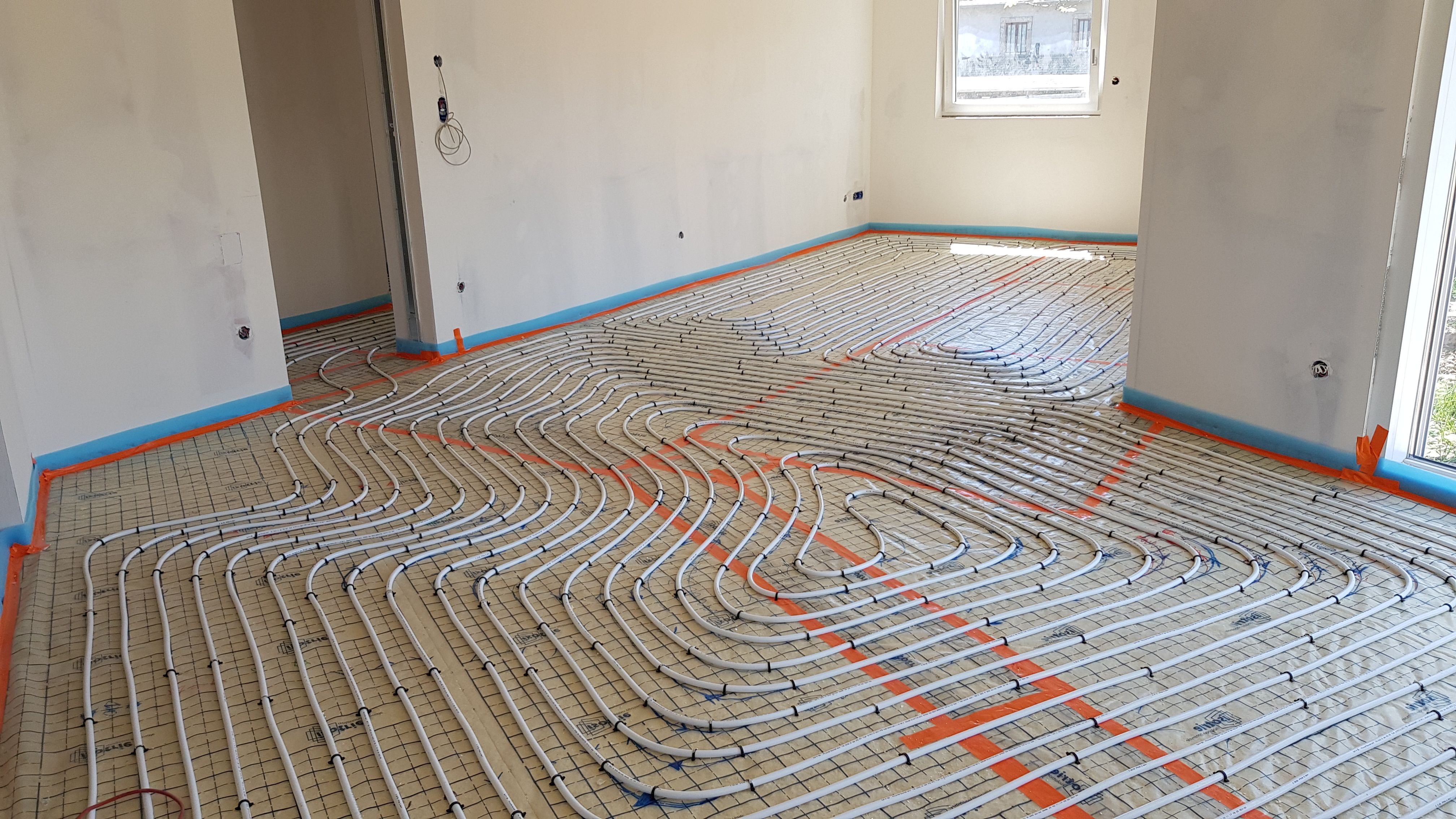 chuaffage au sol installé par géothermie sud alsace